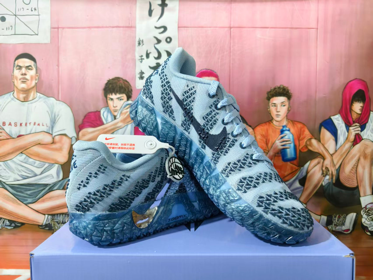 Pair of glacier-blue Nike Ja 2 basketball shoes shown from the side, with patterned uppers and sculpted blue outsoles.