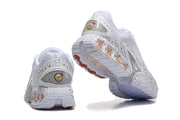 Rear and outsole views of the Nike Air Max DN SE PRM sneakers.