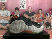Side profile showing the high-top shape, cracked-pattern upper, black trim, and translucent outsole.