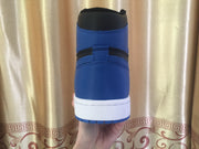 Rear view of one sneaker showing the blue heel panel, black collar and white midsole.