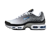 Side view of black, white, and gray Nike Air Max Plus VII sneakers with blue accents and visible cushioning windows.