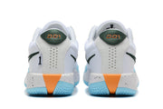 Rear view of the white basketball shoes showing green heel accents, perforated heel panels, and speckled midsoles.