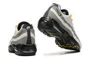 Rear and outsole views of Nike Air Max 95 TT sneakers with visible Air units.