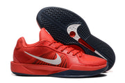 Red Nike Sabrina 2 basketball shoes with dark navy outsole accents