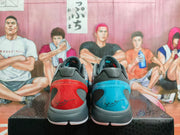 Rear view showing contrasting red and blue heel panels, grey collars, and black detailing.