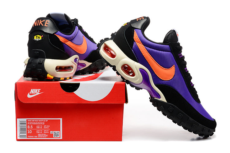 Purple, orange, and black Nike Air Max Plus Utility sneakers shown with a red shoe box.