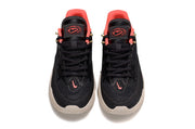 Top view of a pair of black Nike S.T. Flare EP shoes with red details.