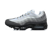 Side profile of a grey and white Nike Air Max 95 TT sneaker