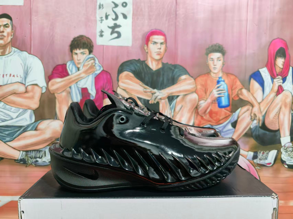 Side view of a black Nike GT Cut 3 basketball shoe with glossy finish and sculpted side panels.