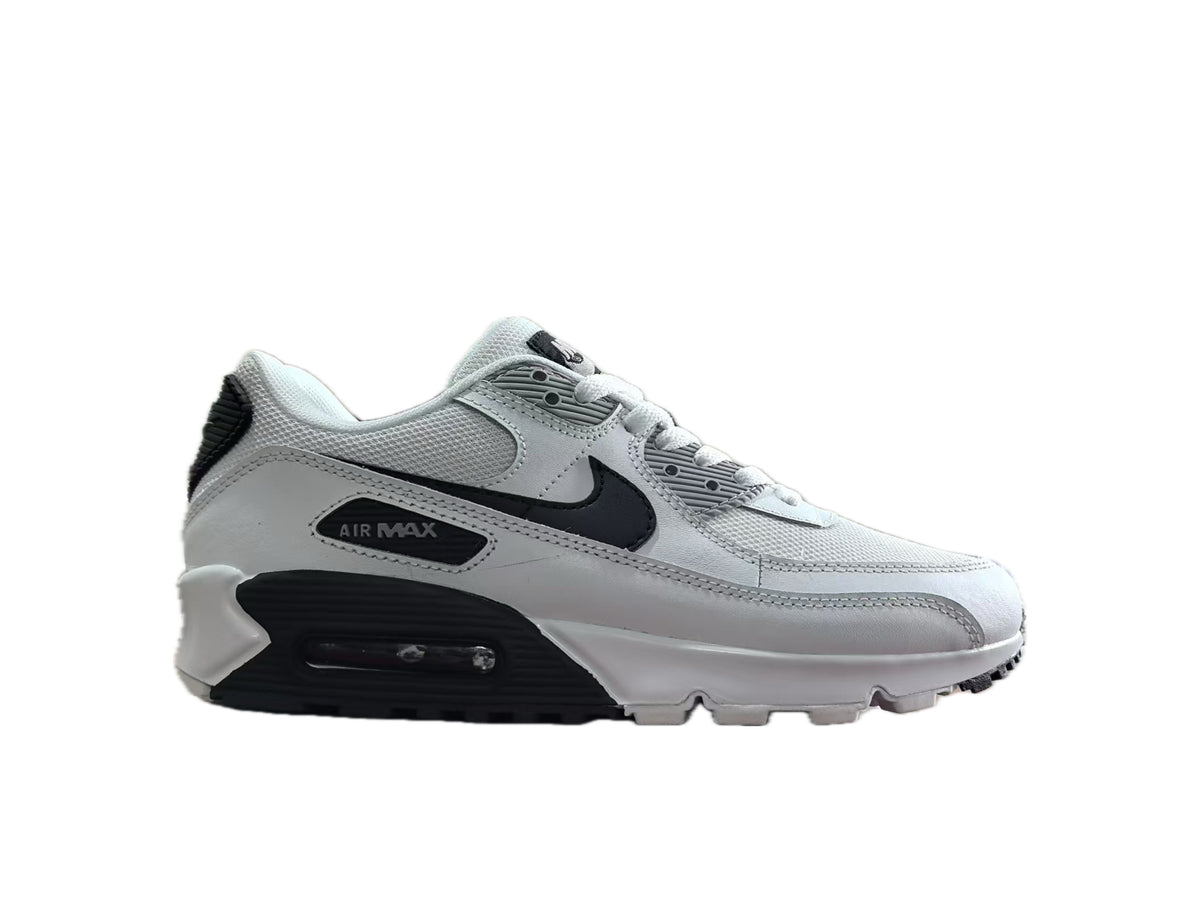 Side view of a white and black Nike Air Max 90 sneaker