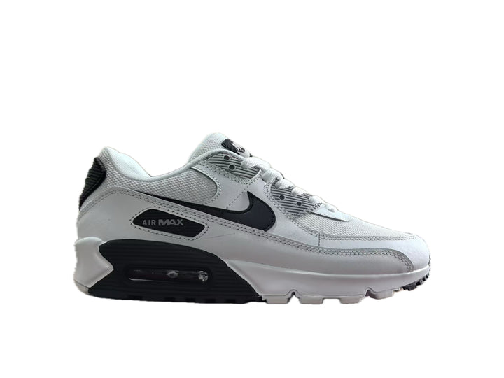 Side view of a white and black Nike Air Max 90 sneaker