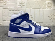 Side profile highlighting the white and blue upper, perforated toe box, collar branding, and blue outsole edge.