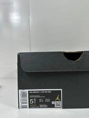 Close-up of the shoe box label showing Air Jordan 1 Low SE (GS), FJ3445-001, and EU 38.