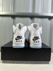 Rear view of the pair showing black Nike Air branding and translucent blue outsole edges.