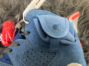 Close-up of the ankle pocket and perforated side panel on the sky blue sneaker.
