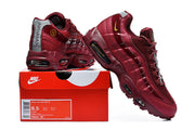 Burgundy Nike Air Max 95 TT sneakers displayed with a box label showing size 8.5 and style code IB6530-601