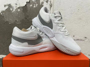 Pair of white and grey Nike Hyperquick low-top training shoes displayed together