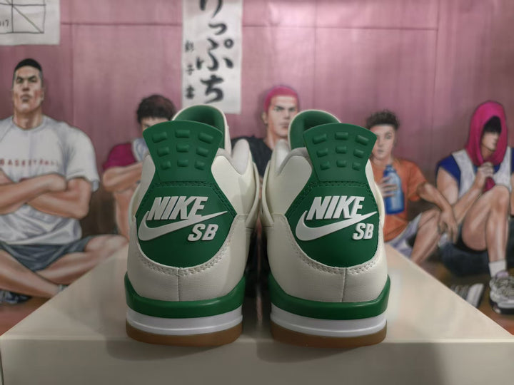 Rear view of white and green sneakers showing green heel panels, Nike SB branding, and gum-colored outsoles.