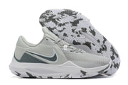 Light gray basketball shoe with dark gray accents and a patterned outsole.