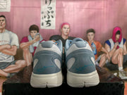 Rear view showing the heel structure and white midsoles