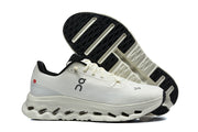White On Cloudmonster 3 sneakers showing the black-and-white outsole pattern.