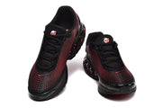 Top and front views of black sneakers with red accents