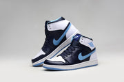 Pair of navy, white, and light blue Jordan 1 Retro high-top sneakers