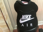 Close-up of the black heel showing visible Nike Air branding.