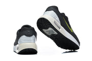 Rear and outsole views of Nike Air Max Verse sneakers, showing the white heel cushioning and black tread.