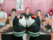 Rear view of the black-and-white shoes with Converse heel lettering