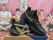 Angled view highlighting the metallic side stripes and gold sole accents