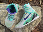 Top and side views of Nike Kobe 9 high-top basketball shoes