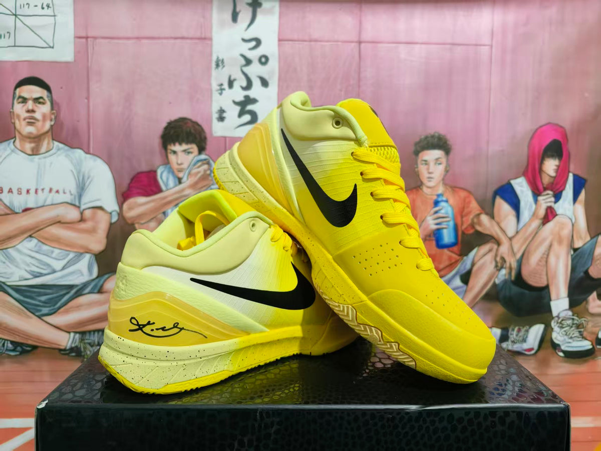 Pair of yellow high-top basketball sneakers with black Nike Swoosh branding displayed on a box.