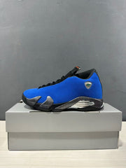 Side profile of a blue Jordan Air Jordan 14 Retro sneaker with black trim, silver accents, and a Florida Gators emblem.