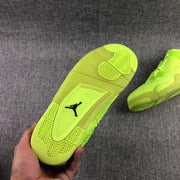 Close view of the fluorescent green outsole with patterned tread and black Jordan logo insert.