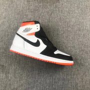 Side profile of a high-top Jordan sneaker with black and white panels and an orange outsole.