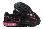 Side view and outsole of black and pink Nike Air Max BW sneakers