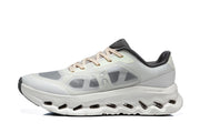 Side view of a white and gray On Cloudtilt Remix sneaker.