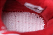 Close-up of the red-lined interior and visible insole texture.