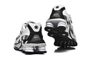 Rear and outsole views of Nike Shox Ride 2 sneakers, showing the heel columns and tread.