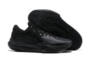 All-black basketball shoe with a dark patterned outsole.