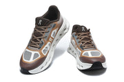Front and angled views of the On Cloudtilt Remix sneakers