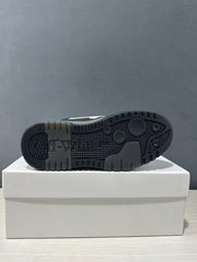 Underside view showing the patterned black rubber outsole and Off-White branding.