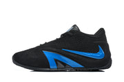 Side profile of a black low-top sneaker with bright blue accents