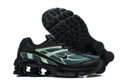 Nike Shox Ride 2 sneaker shown from the outsole and side, highlighting the tread and heel columns.