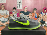 Side view showing the Nike Swoosh, black panel, and volt-green sole accent.