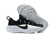 Nike LeBron sneaker pair showing the white patterned outsoles.