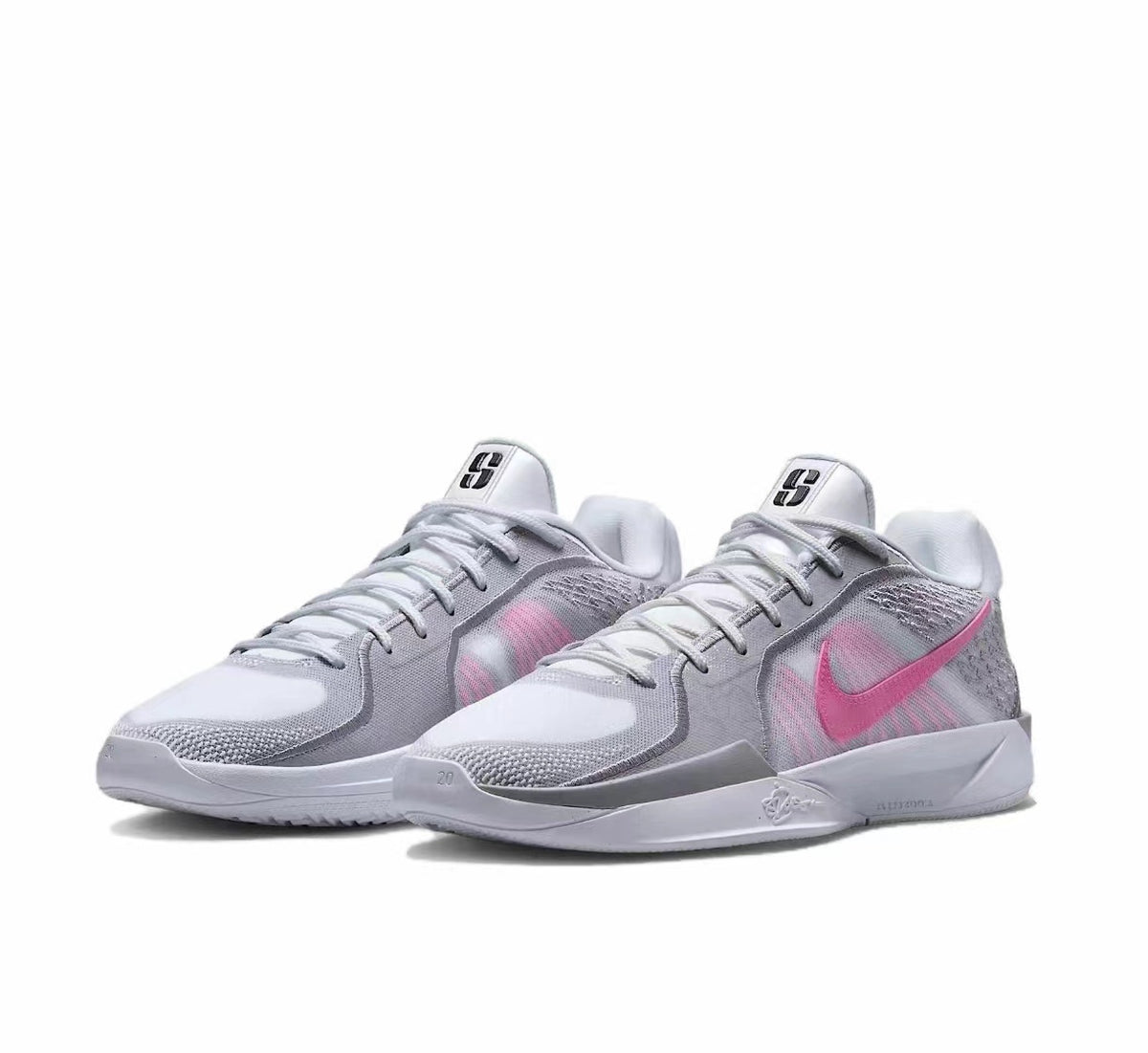 Pair of white Nike basketball sneakers with pink Swoosh accents, layered mesh panels and padded collars.