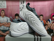 Angled side view of white Nike GT Cut 3 basketball shoes with sculpted side panels