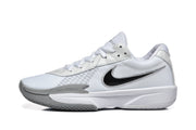 Side profile of a white and grey Nike GT Cut Academy shoe.